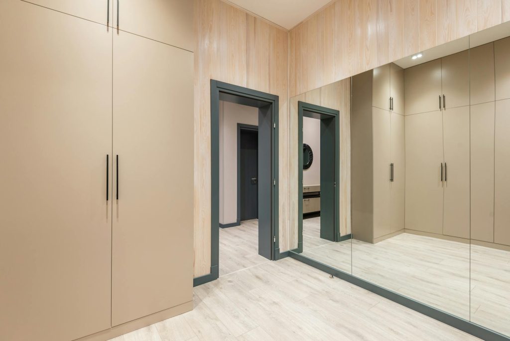 a modern walk in wardrobe